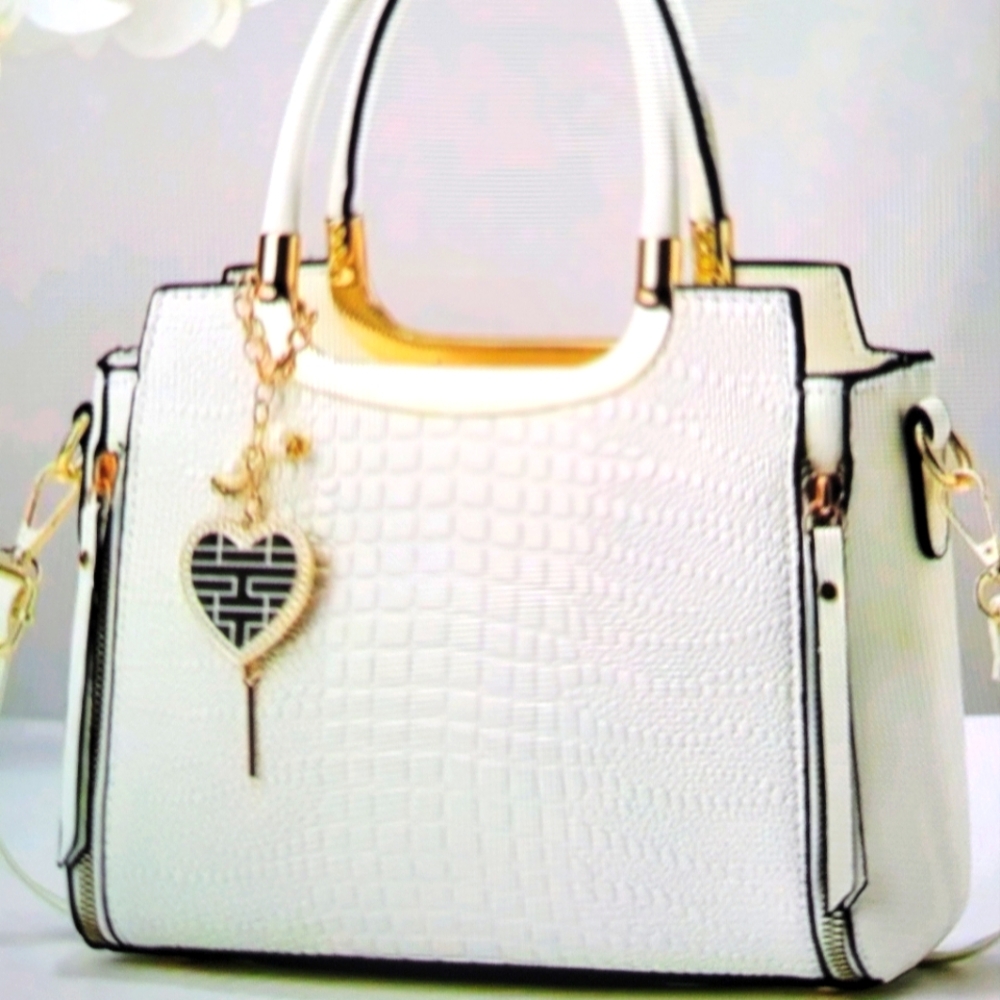 White shoulder handbag.